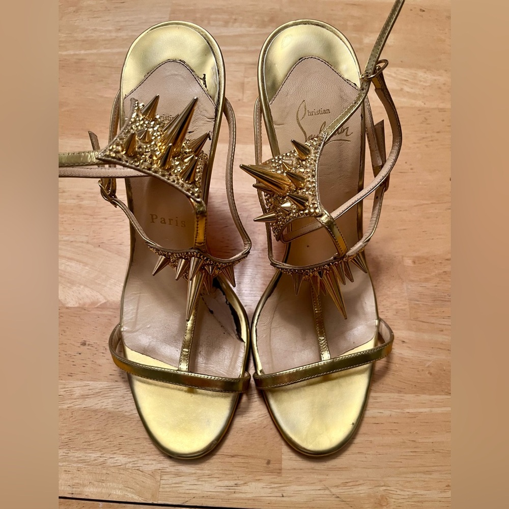 Christian Louboutin spiked Leather Heeled Sandals.